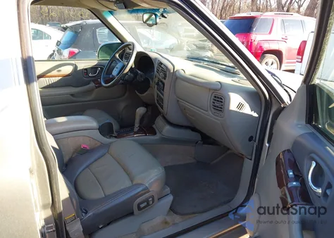 1999 GMC Envoy z USA, uszkodzony, nr VIN 1GKDT13W0X2952675